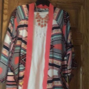 3 piece outfit. Tank, vest and necklace